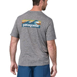 Polo Manga Corta Hombre Capilene® Cool Daily Graphic Shirt - Waters Boardshort Logo Abalone Blue: Feather Grey